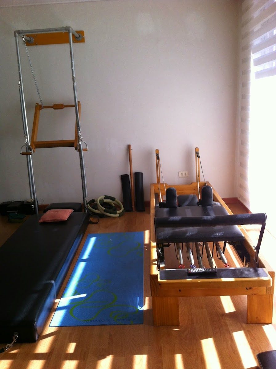 Reformer y wall unit reales del estudio EPC Wellness